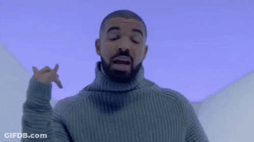 Bearded Man In Turtleneck Under Blue Sky GIF