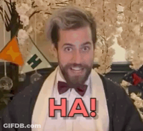 Bearded Man In Tuxedo Smiling Says Ha GIF
