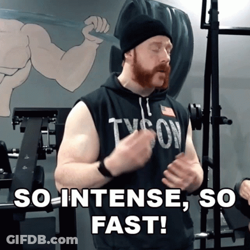 Bearded Man In Tyson Shirt In Gym GIF