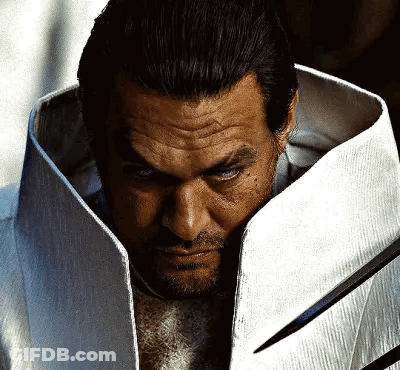 Bearded Man In White Coat Holding Sword GIF