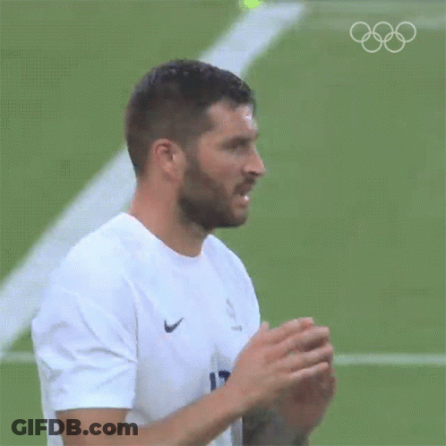 Bearded Man In White Nike Shirt On Soccer Field GIF