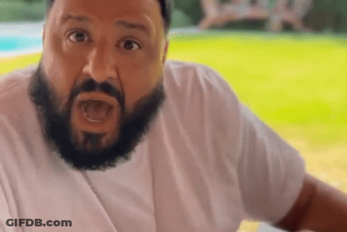 Bearded Man In White Shirt Making Funny Face GIF