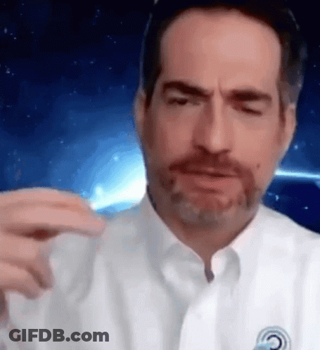 Bearded Man In White Shirt Making Funny Face GIF