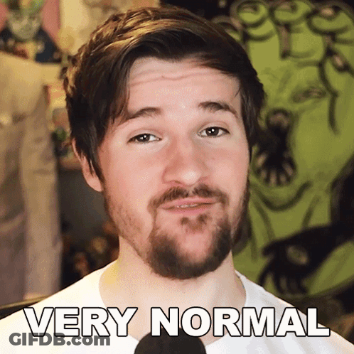 Bearded Man In White Shirt Saying Very Normal GIF
