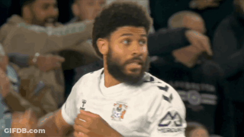 Bearded Man In White Shirt With Letter M GIF
