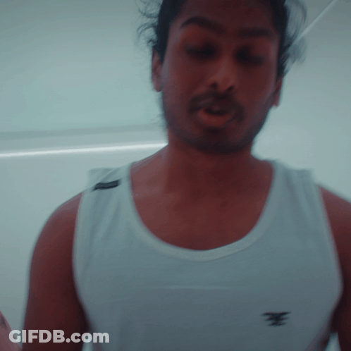 Bearded Man In White Tank Top With E GIF