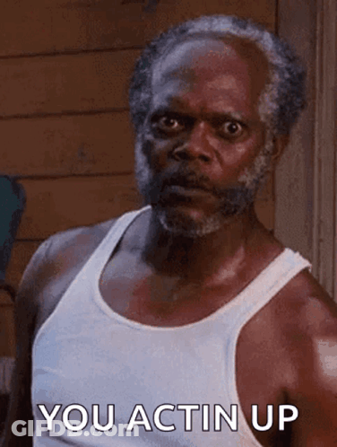 Bearded Man In White Tank Top You Actin Up GIF