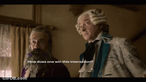 Bearded Man In Wig Asking How Does One Win This Interaction GIF