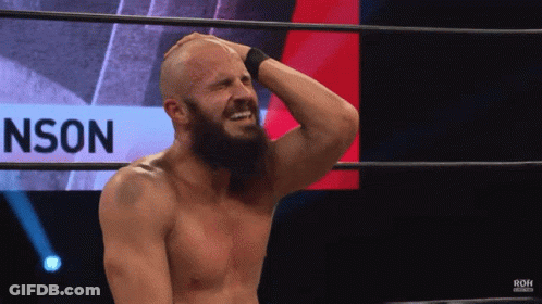 Bearded Man In Wrestling Ring With Nson Behind Him GIF