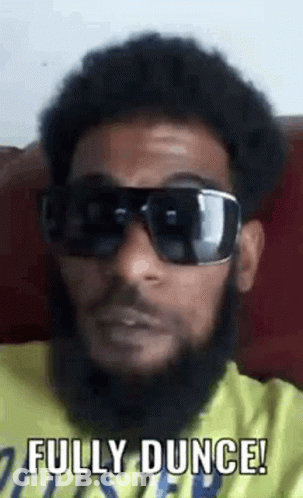 Bearded Man In Yellow Shirt And Sunglasses GIF
