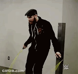 Bearded Man Jumping Rope Near Yellow Tape Measure GIF