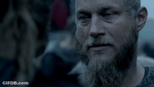 Bearded Man Looking At Another Man GIF