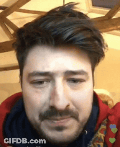 Bearded Man Looking At Camera GIF