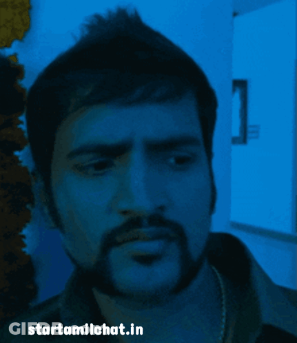 Bearded Man Looking At Camera Starttamilchat.in GIF