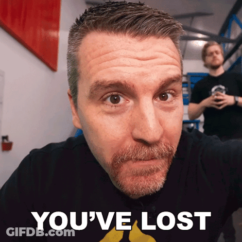 Bearded Man Looking At Camera With You've Lost Below GIF