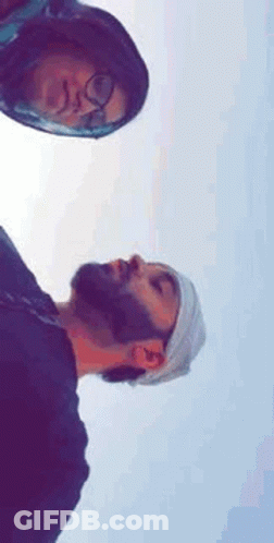 Bearded Man Looking At Mirror GIF