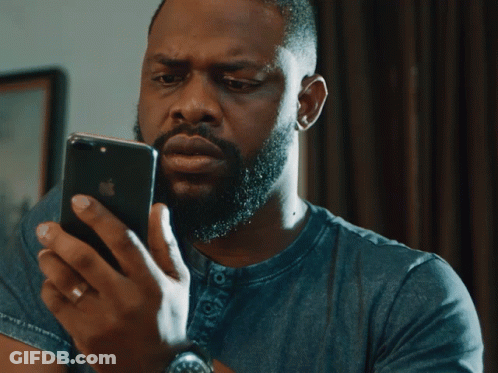 Bearded Man Looking At Phone Eyes Closed GIF
