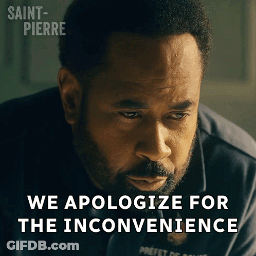 Bearded Man Looking Down Saying We Apologize For The Inconvenience GIF
