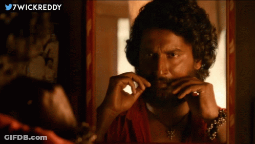 Bearded Man Looking In Mirror With 7Wickreddy GIF