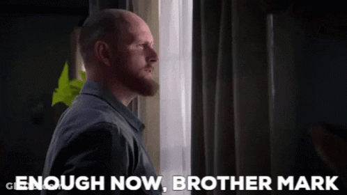 Bearded Man Looking Out Window With Enough Now Brother Mark GIF