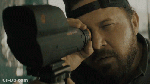Bearded Man Looking Through Nikon Camera GIF