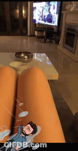 Bearded Man Lying On Chair GIF