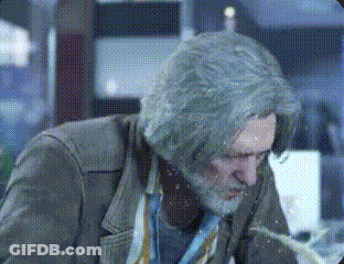 Bearded Man Lying On Floor Eyes Closed Another Man Watching GIF