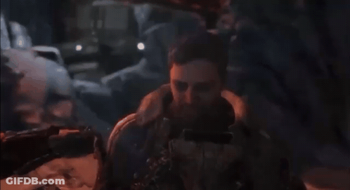 Bearded Man Lying On Ground In Video Game GIF