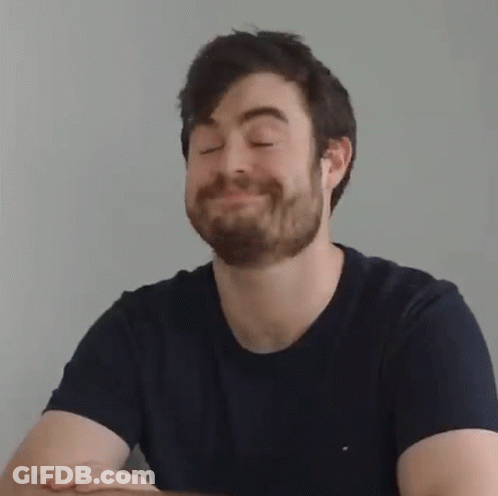 Bearded Man Making Funny Face Arms Crossed GIF