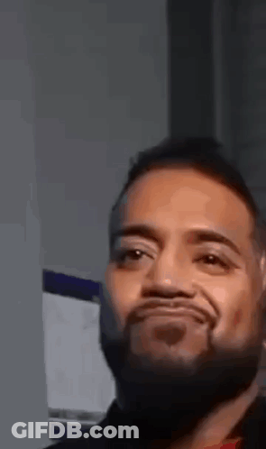Bearded Man Making Funny Face At Camera GIF