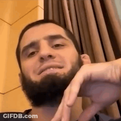 Bearded Man Making Funny Face By Window GIF