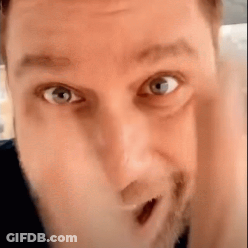 Bearded Man Making Funny Face Hand To Face GIF