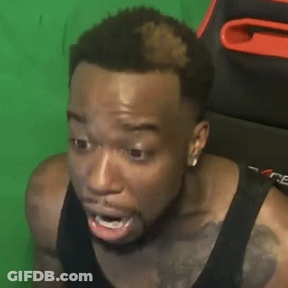 Bearded Man Making Funny Face In Chair GIF