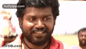Bearded Man Making Funny Face In Front Of Crowd GIF
