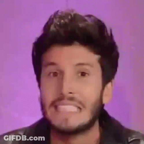 Bearded Man Making Funny Face In Leather Jacket GIF