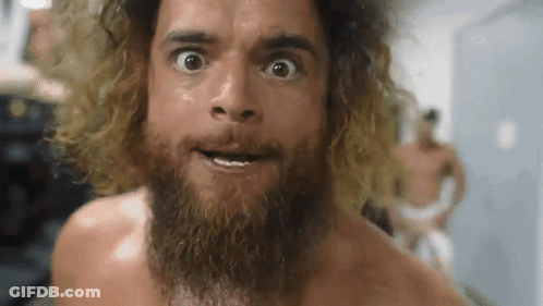 Bearded Man Making Funny Face In Locker Room GIF