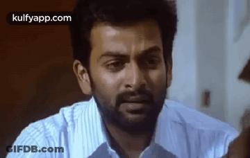 Bearded Man Making Funny Face In White Shirt GIF