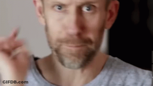 Bearded Man Making Funny Face Pointing At Camera GIF