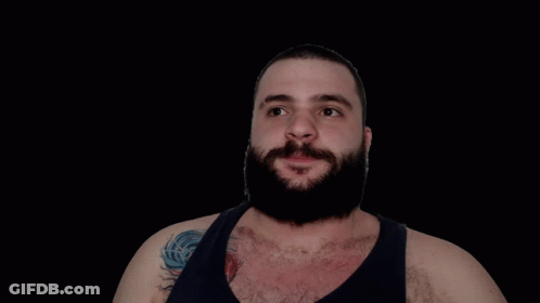 Bearded Man Making Funny Face Pointing Up GIF