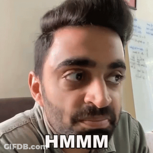 Bearded Man Making Funny Face Saying Hmm GIF