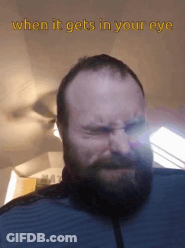 Bearded Man Making Funny Face Saying When It Gets In Your Eye GIF