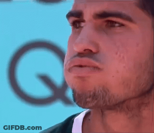 Bearded Man Making Funny Face With Blue Q GIF