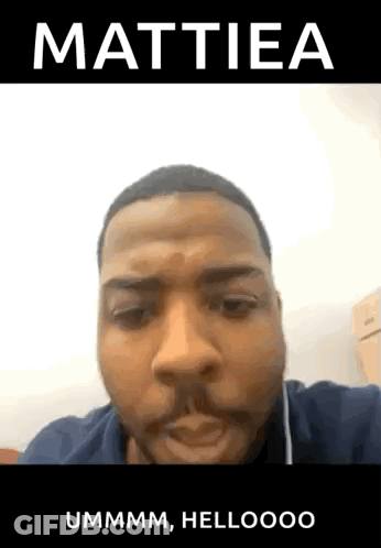 Bearded Man Making Funny Face With Earbuds In Black Shirt GIF