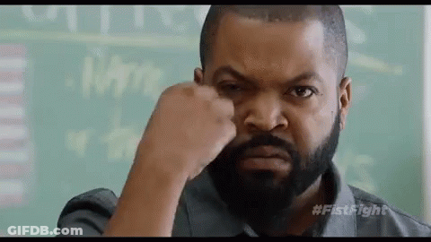 Bearded Man Making Funny Face With Fist GIF