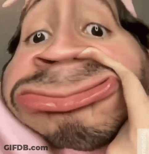 Bearded Man Making Funny Face With Hand On Face GIF