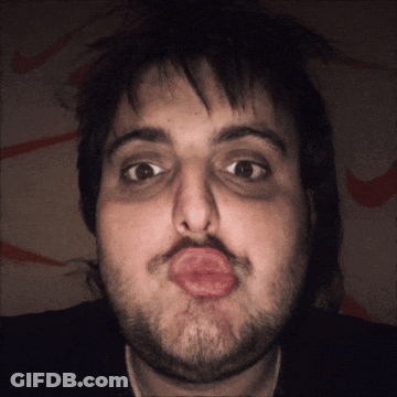 Bearded Man Making Funny Face With Lips GIF