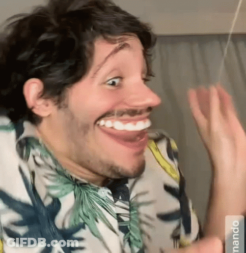 Bearded Man Making Funny Face With Tongue Out GIF