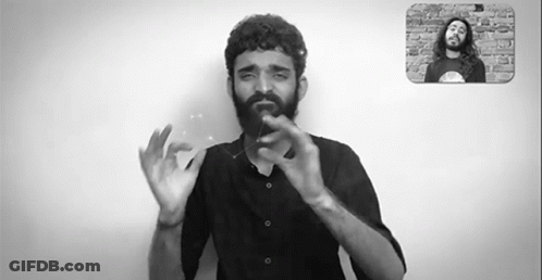 Bearded Man Making Hand Gesture GIF