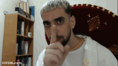 Bearded Man Making Shhh Gesture GIF