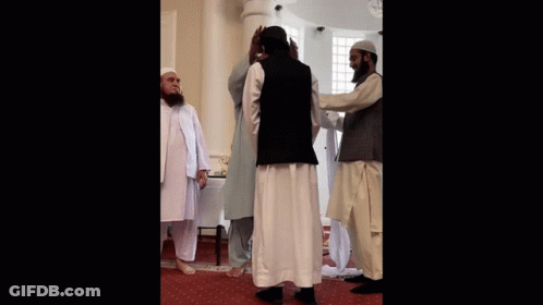 Bearded Man Next To Group Of Men GIF